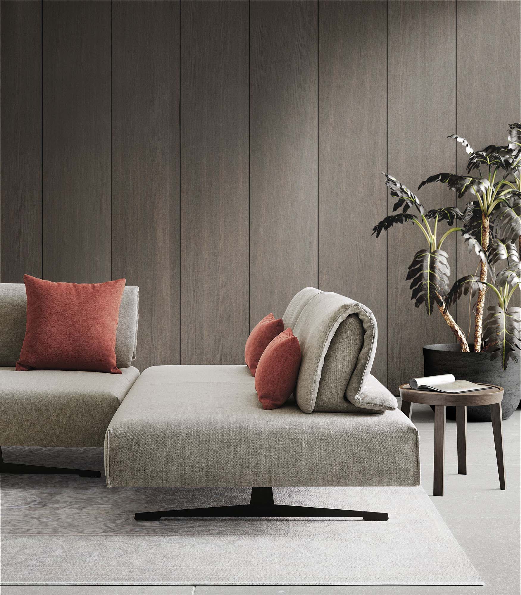 Divano grigio di design con schienali mobili traslabili