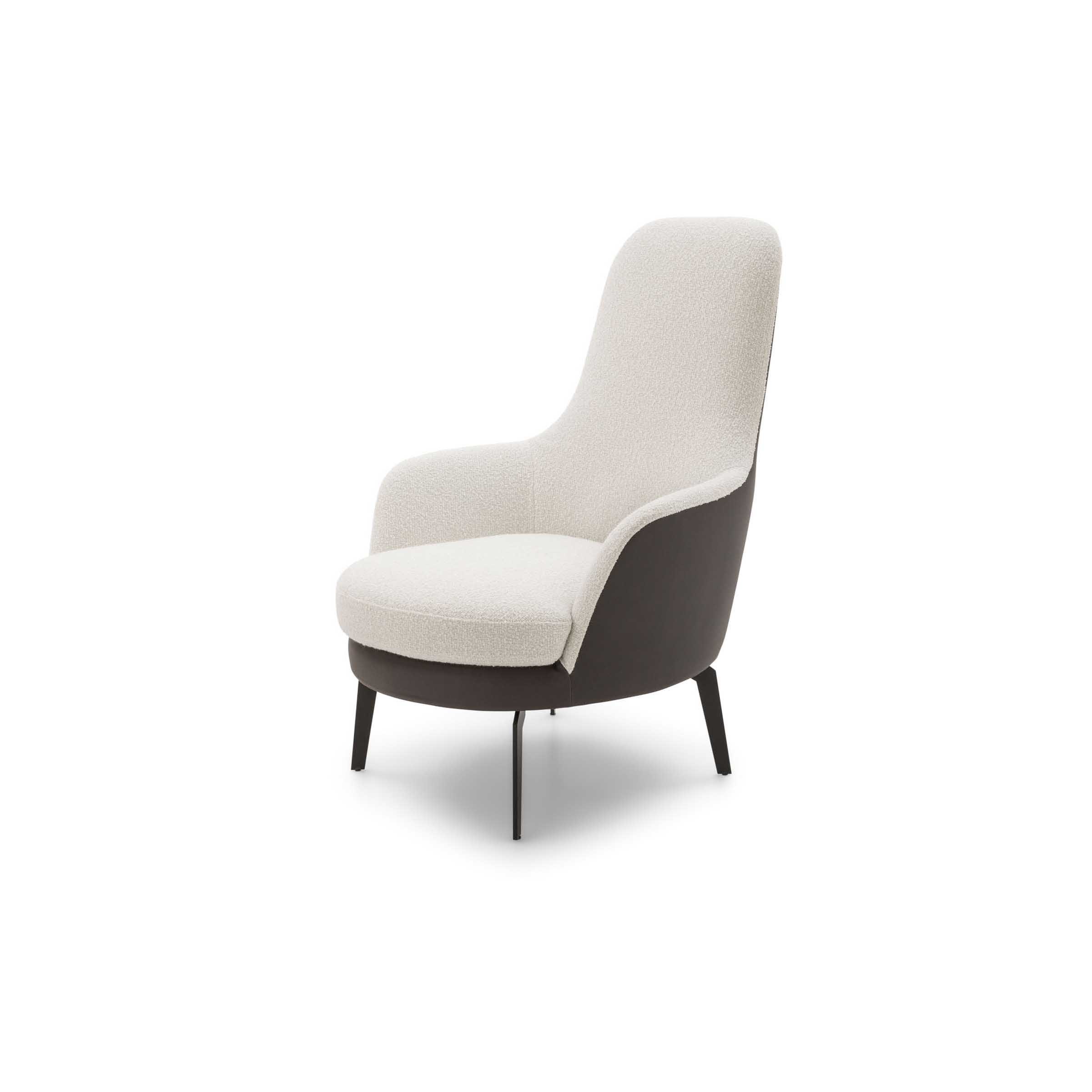 Poltroncina con schienale alto e braccioli comodi e rivestimento bicolore. Poltroncina con schienale alto e braccioli comodi. Rivestimento bicolore.